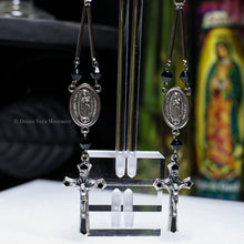 Load image into Gallery viewer, Black rosary earrings Virgen Mary jewelry Religious hoop earrings Catholic-inspired earrings Faithful black rosaries Devotional earrings Christian jewelry hoops Elegant rosary drops Spiritual hoop earrings Unique Virgen Mary pieces Noir rosary dangles Divine black jewelry Sacred Mary earrings Faithful fashion accessories Rosary-inspired black hoops Holy Virgin Mary drops Christian elegance earrings Religious statement jewelry Black rosaries with faith Devotion-inspired hoops