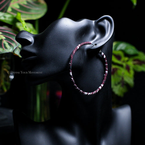 Transform your look with our Burgundy Bandana Hoop Earrings! Featuring vibrant fabric and a lightweight design, these earrings are sure to add a playful touch to any outfit. Comfortable for all-day wear, they'll quickly become your go-to accessory.