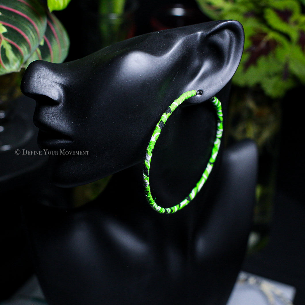 Transform your look with our Neon Green Bandana Hoop Earrings! Featuring vibrant fabric and a lightweight design, these earrings are sure to add a playful touch to any outfit. Comfortable for all-day wear, they'll quickly become your go-to accessory.