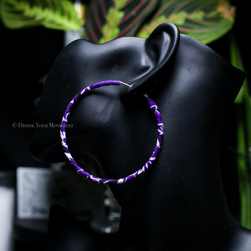 Transform your look with our Thin Purple Bandana Hoop Earrings! Featuring vibrant fabric and a lightweight design, these earrings are sure to add a playful touch to any outfit. Comfortable for all-day wear, they'll quickly become your go-to accessory.